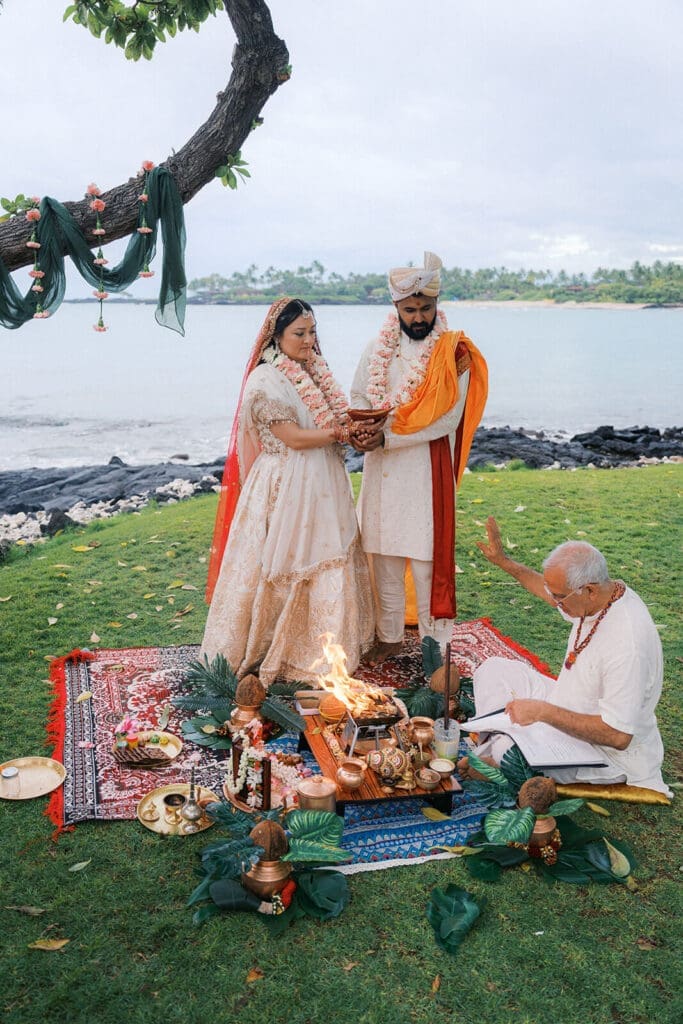 Hindu wedding ceremony on the grass at Kikaua Point Park, Big Island Hawaii