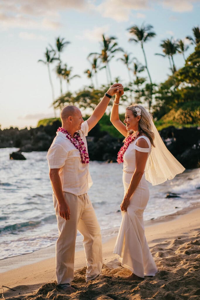 Couple dancing at Kukio Beach, Kona Hawaii wedding photography