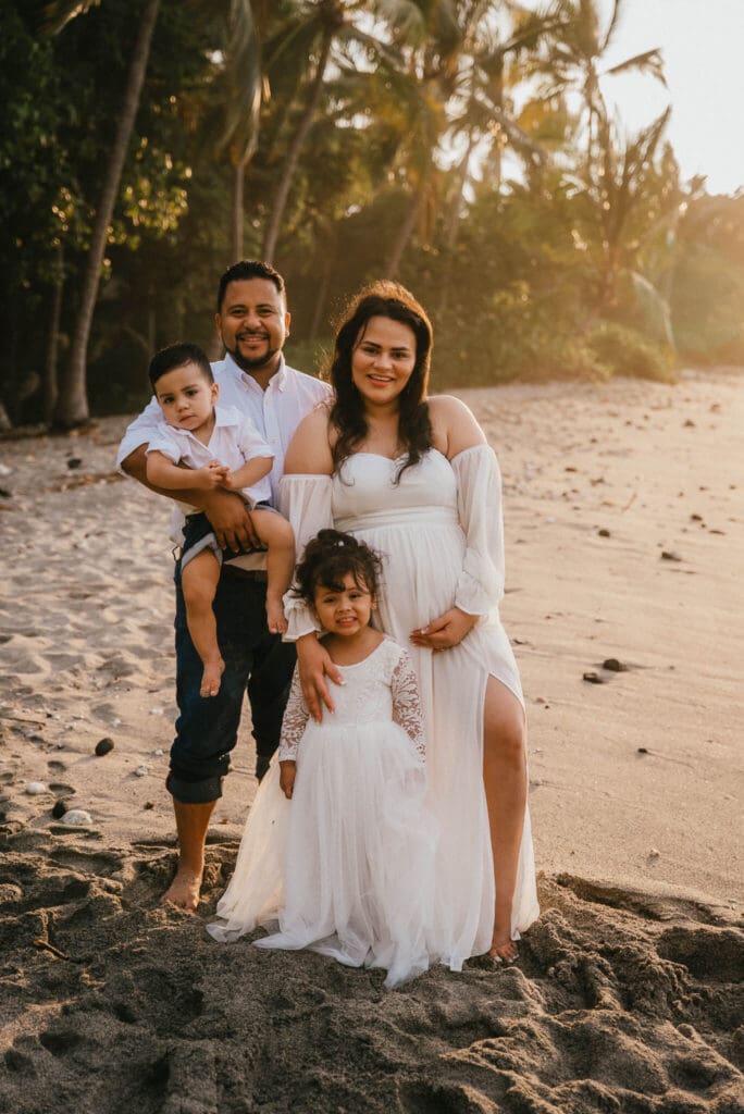 Family photo on the beach at Ke'ei Beach, Big Island Hawaii